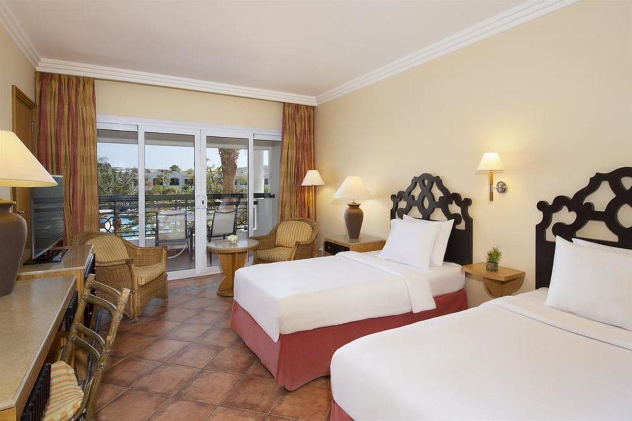 Sharm Dreams Vacation Club - Aqua Park Hotel Exterior foto A room at the Hilton Luxor