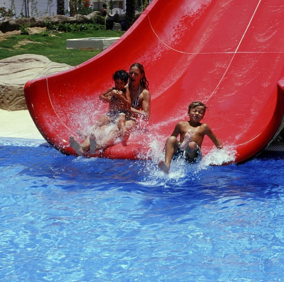 Sharm Dreams Vacation Club - Aqua Park Hotel Exterior foto A water slide