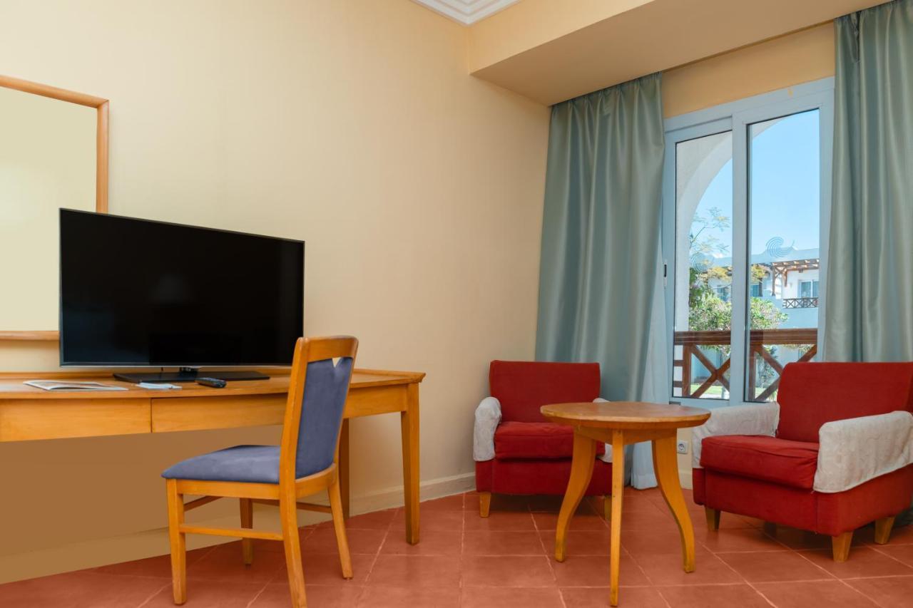 Sharm Dreams Vacation Club - Aqua Park Hotel Exterior foto A room at the hotel
