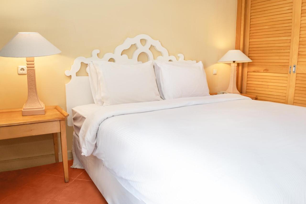 Sharm Dreams Vacation Club - Aqua Park Hotel Exterior foto A bed