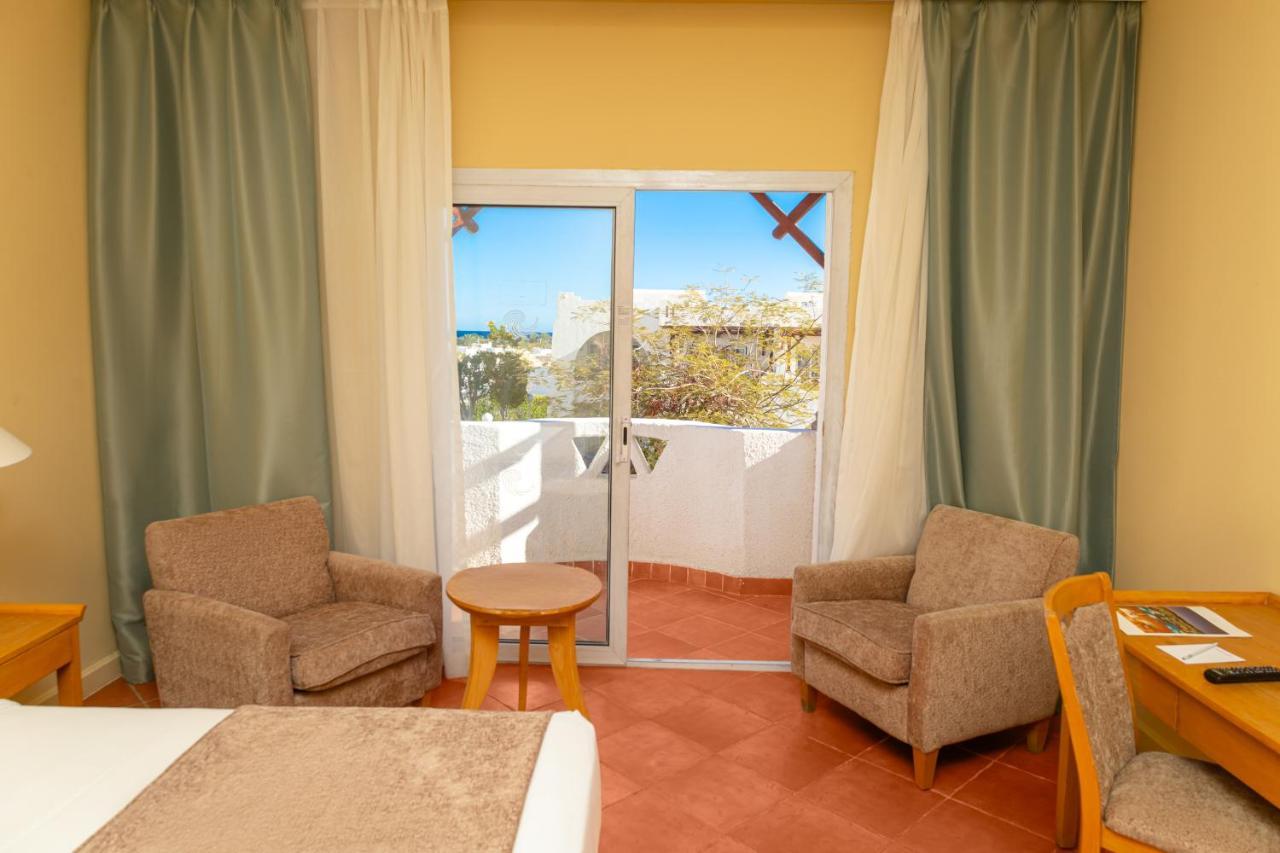 Sharm Dreams Vacation Club - Aqua Park Hotel Exterior foto A room at the hotel