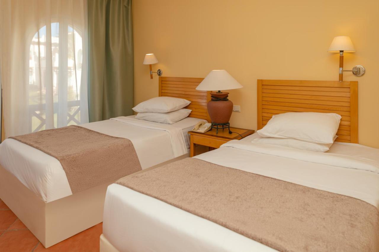 Sharm Dreams Vacation Club - Aqua Park Hotel Exterior foto A bedroom