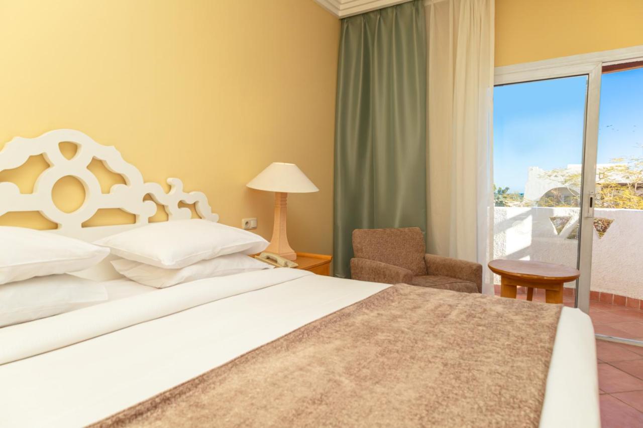 Sharm Dreams Vacation Club - Aqua Park Hotel Exterior foto A bedroom at the hotel